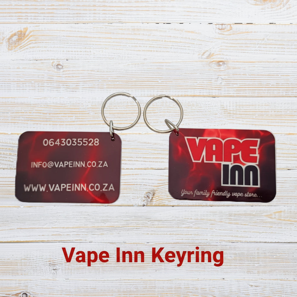 Custom personalized VAPE INN keyring with engraved design, featuring a metal keyring with customizable charm and vibrant finish.