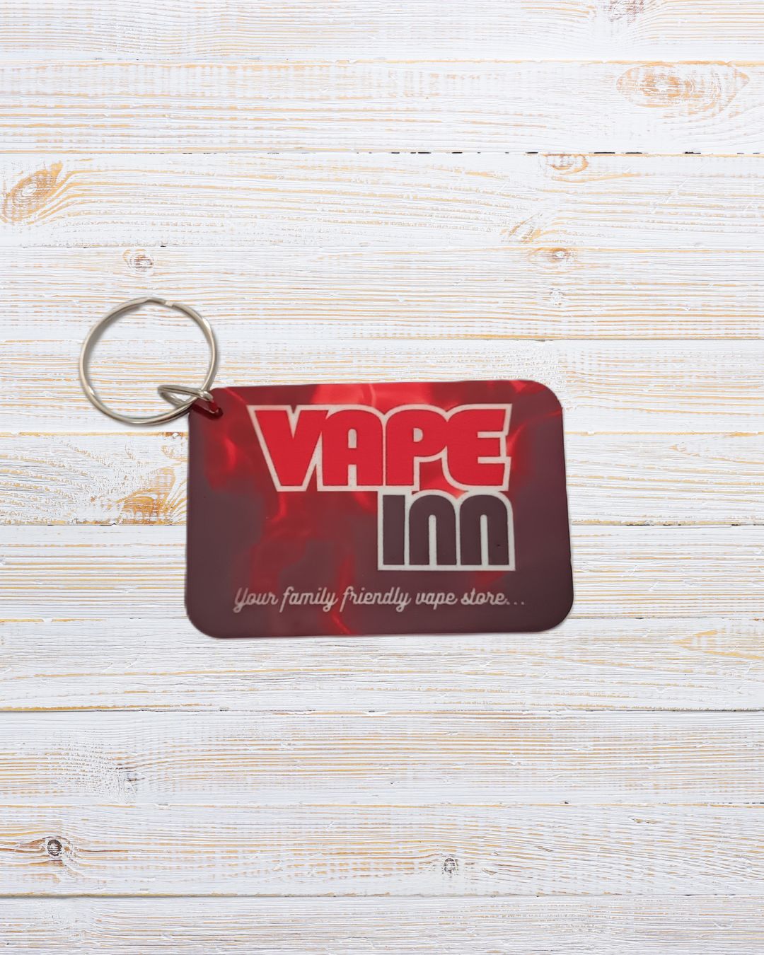 Keychain with 'Vape Inn' logo